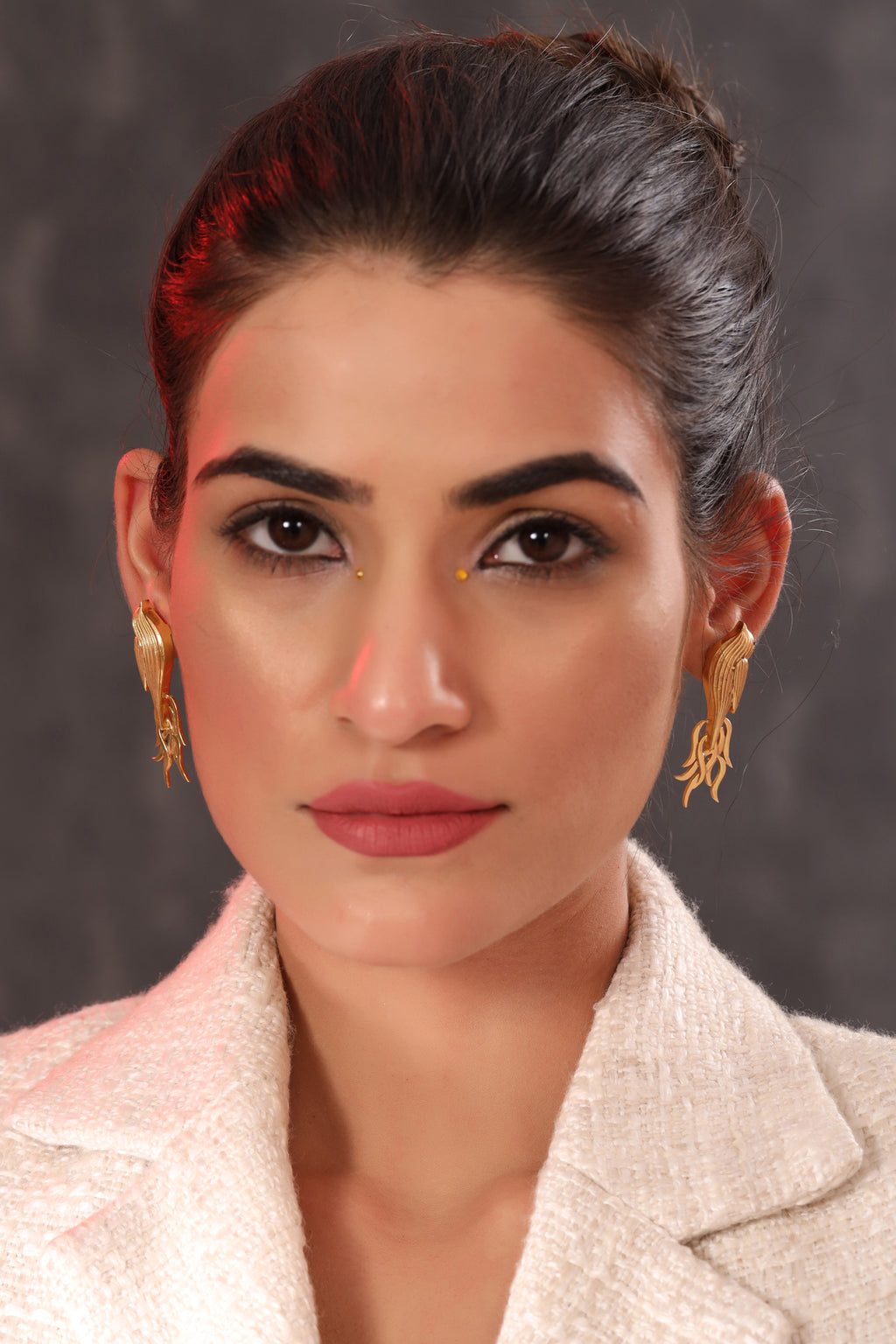 The Golden Bird Studs.