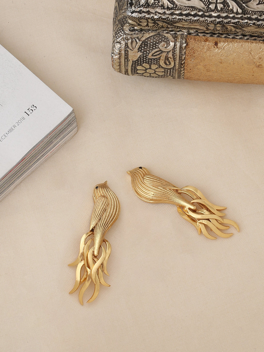 The Golden Bird Studs.